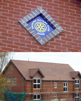 Roof tiling complete, scaffolding coming down and Reading Rotary Club plaque installed in gable end.